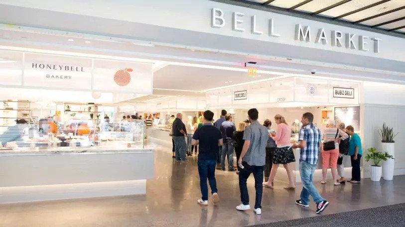Co-work, eat, and socialize at the same building. Food hall opens inside the building that birthed the cellphone.